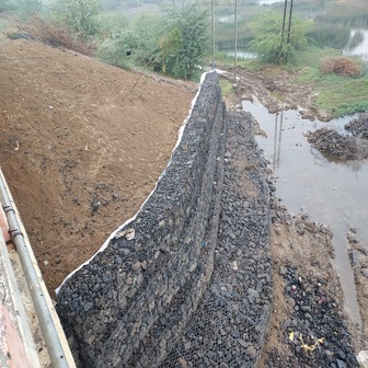 BRIDGE PIER AND ABUTMENT PROTECTION WITH TECHFAB METAL GABION AND MATTRESS