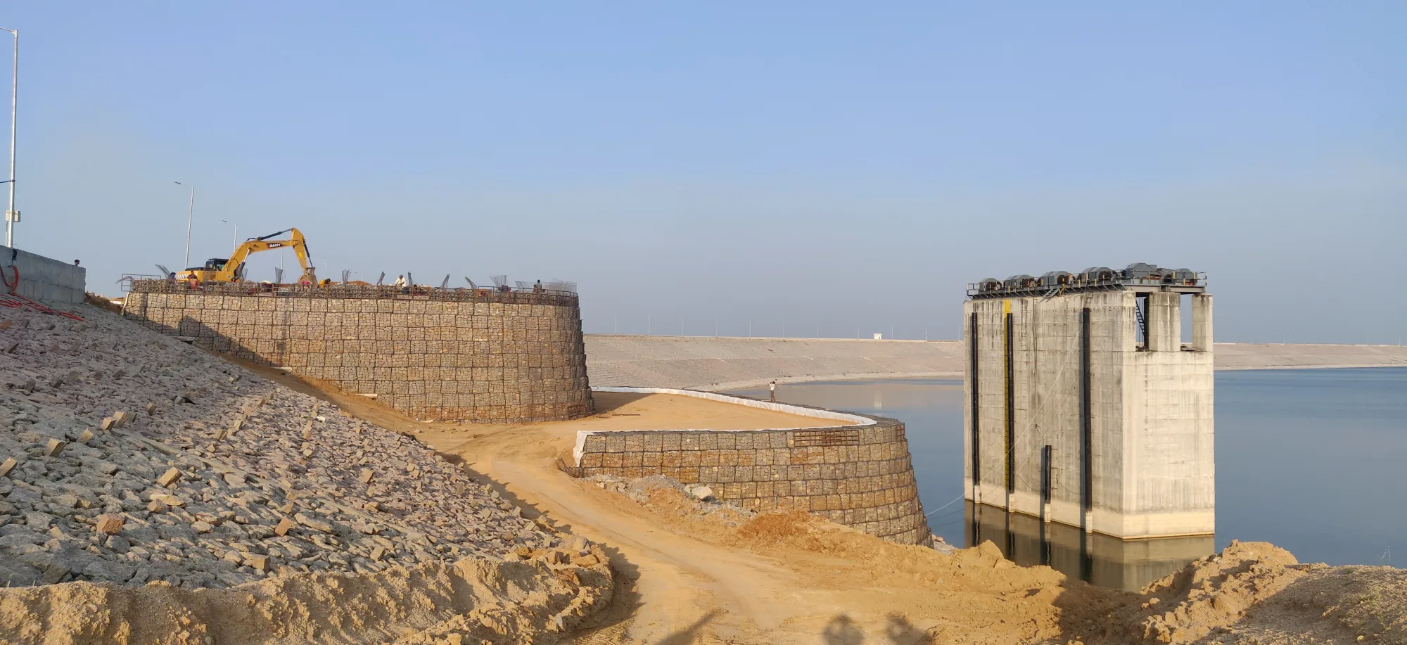 Reinforced Soil Structure to Support Bow String Bridge