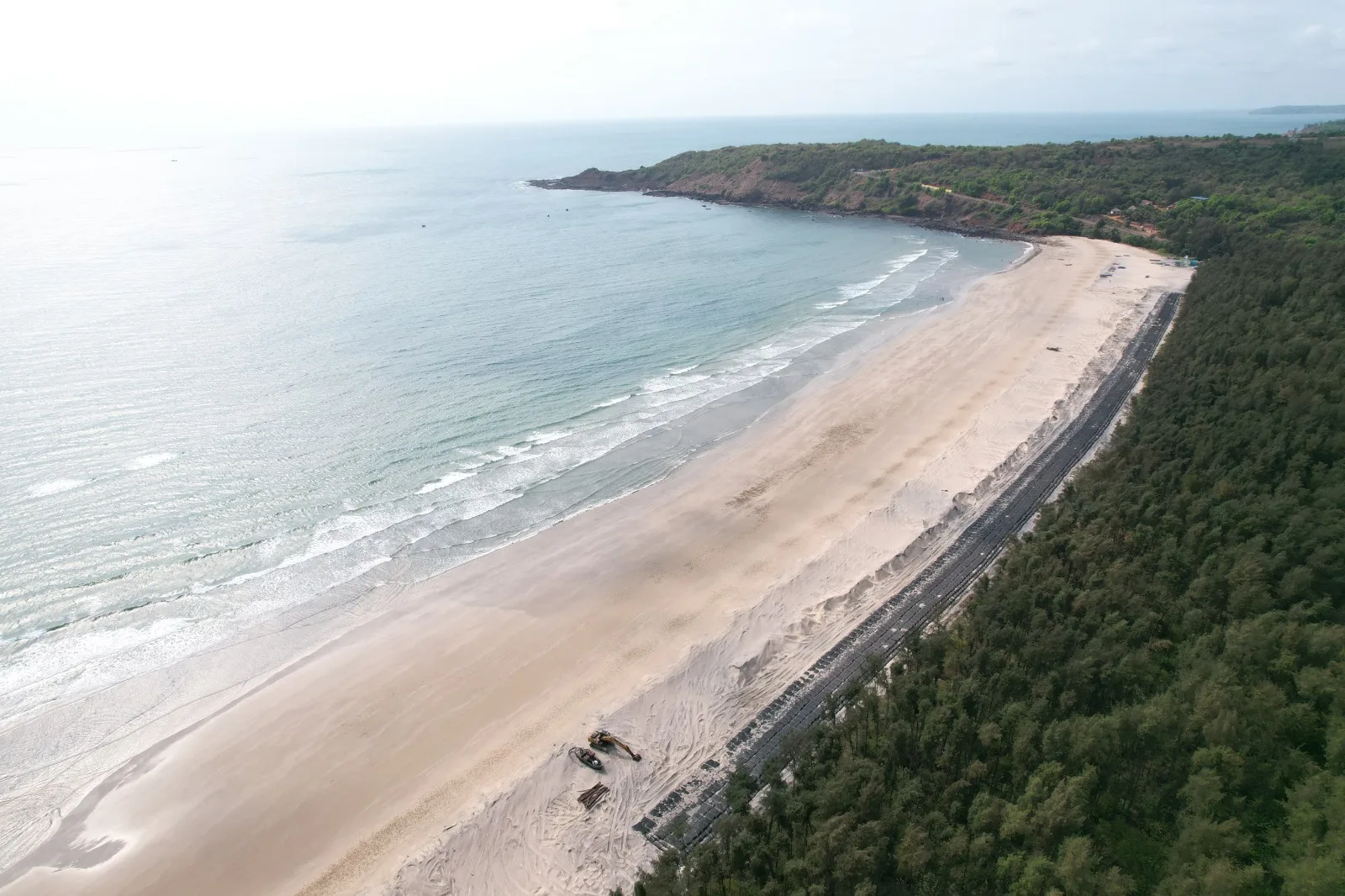 Coastal and Shoreline Protection - aerial view of geotextile tube shoreline protection