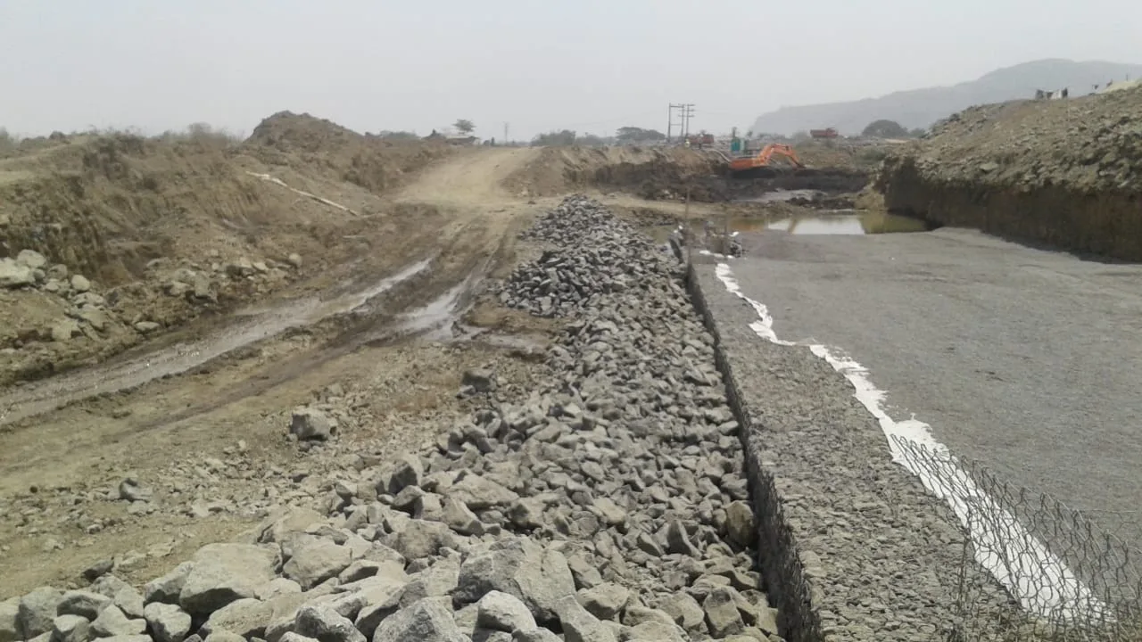 RIVER TRAINING WITH GABION FASCIA REINFORCED SOIL WALL FOR GADHI RIVER ALONG NAVI MUMBAI INTERNATIONAL AIRPORT, NAVI MUMBAI