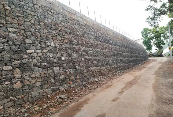 Sustainable Replacement of a Failed Stone Masonry Retaining Wall with Gabion Retaining Structures at the Factory Premises of Greenland Particle Boards, Ernakulam, Kerala