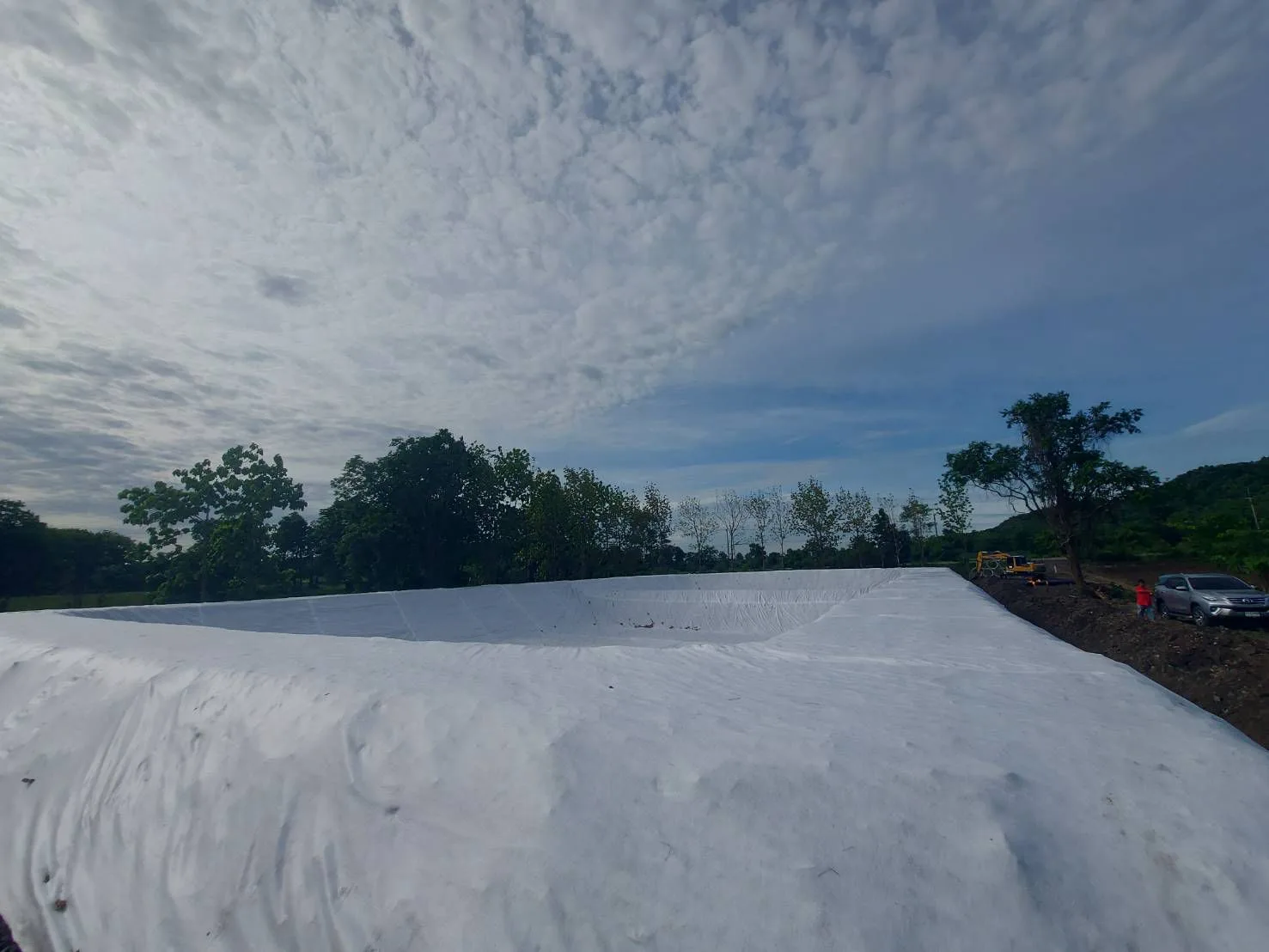 PROTECTION OF AGRICULTURAL WATER STORAGE POND USING TECHGEO NONWOVEN GEOTEXTILE