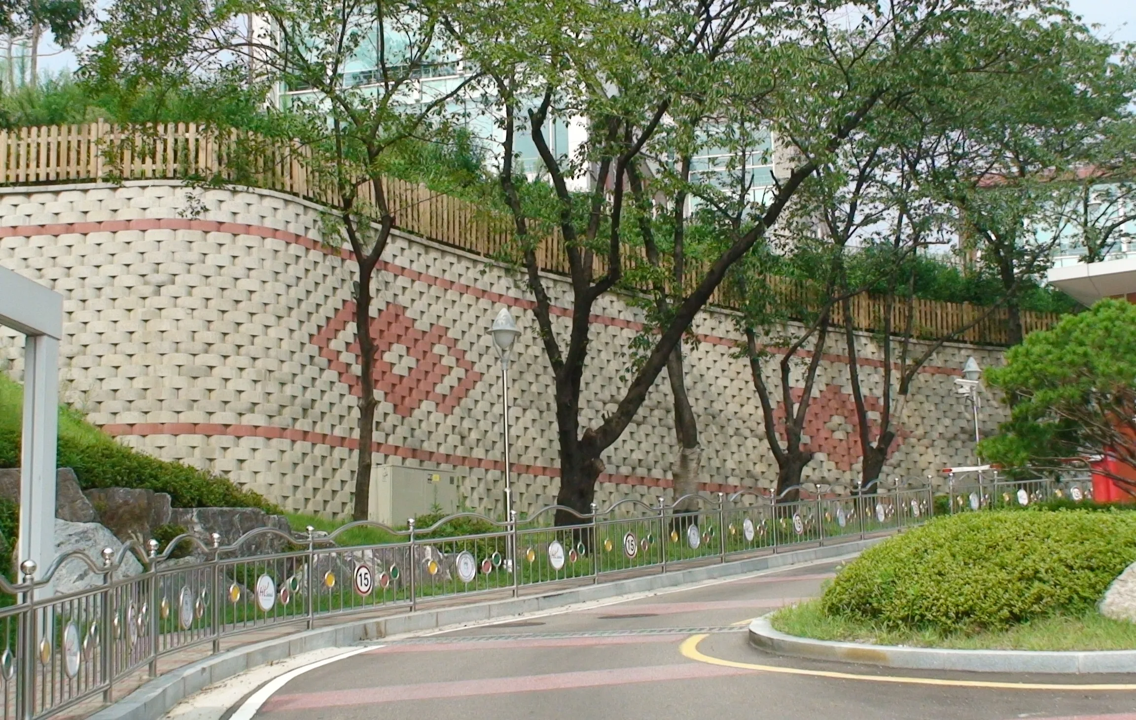 Landscaped reinforced soil wall at a real estate development